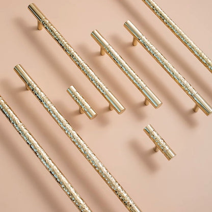 Saya - Hamrad polerad mässing